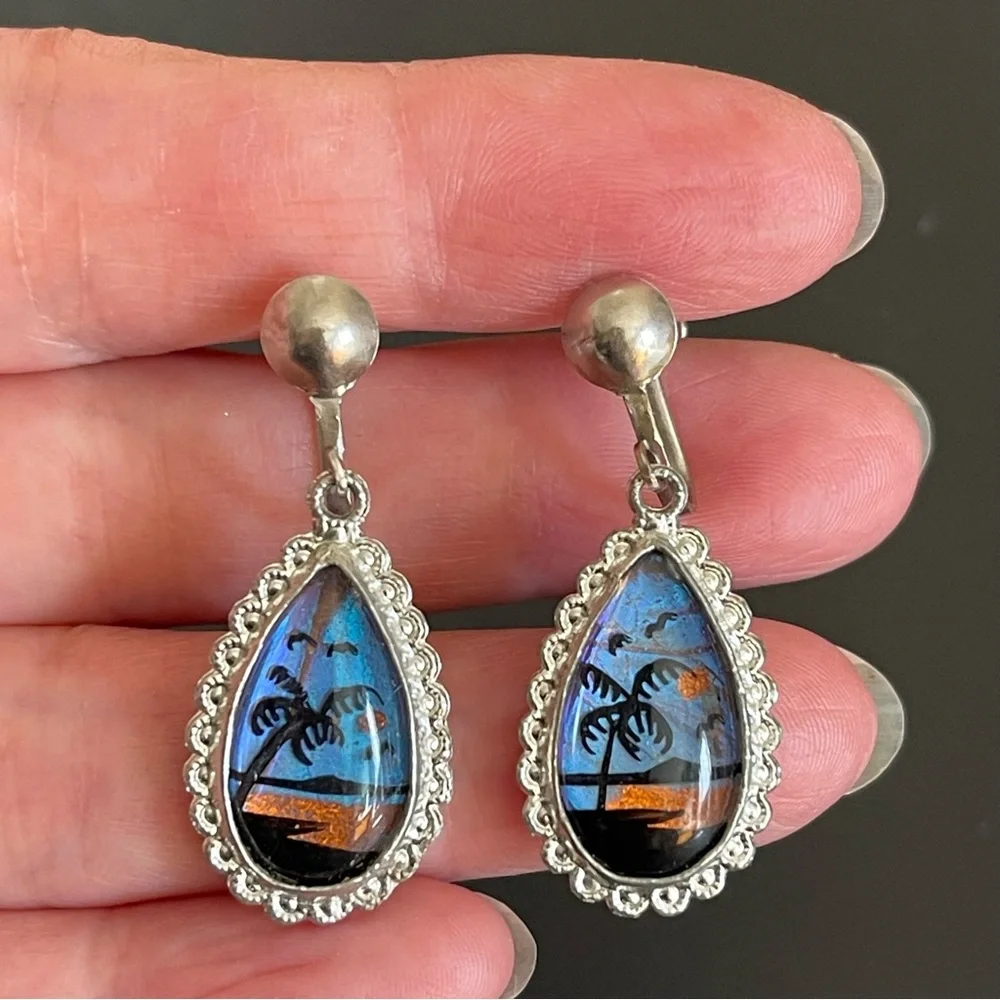 Vintage teardrop blue & black butterfly wing screw on earrings.